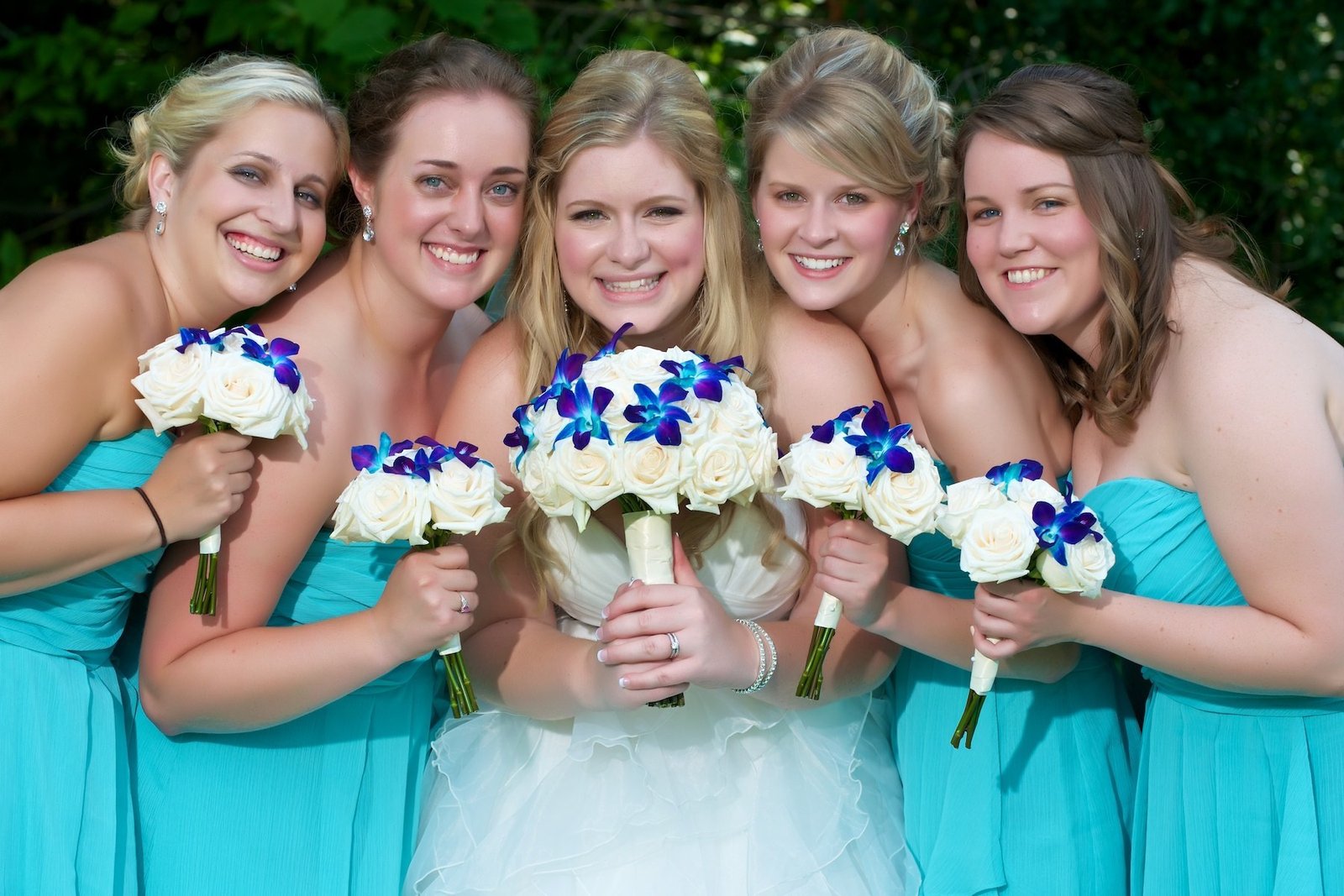 Bridal and Bridesmaid bouquets with blue orchids